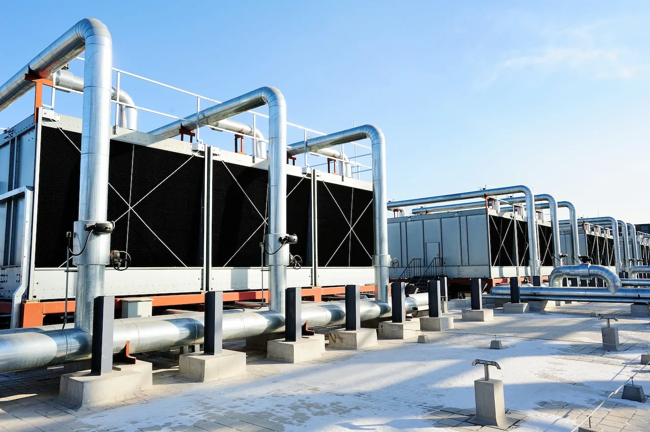 Sets Of Cooling Towers In Data Center Building. Sets Of Cooling Towers In Data Center Building.