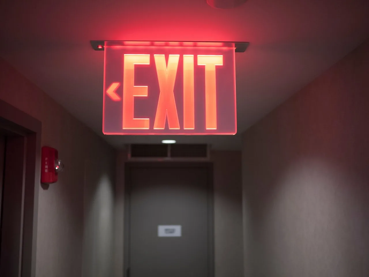 Glowing Red Exit Sign. Glowing Red Exit Sign.